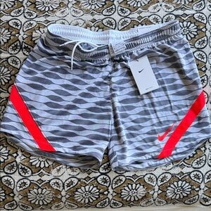 Nike Women’s - Medium - Gray Athletic Shorts with electric orange accents